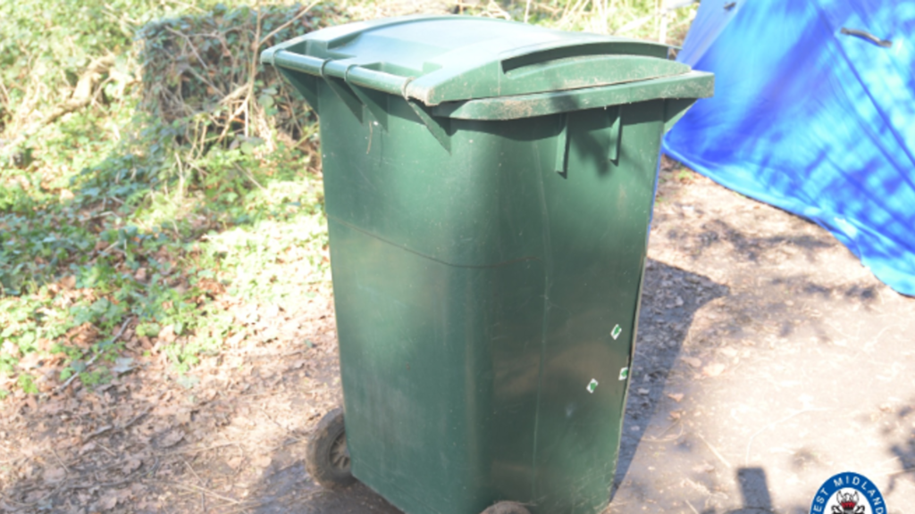 Coventry Murder Hunt: Victim Had Distinctive Irish Flag And Snake Tattoos, Police Reveal The wheelie bin the man was found in. Pic: West Midlands Police