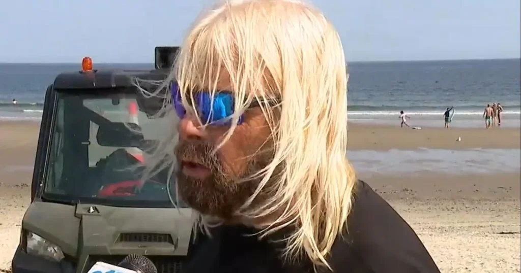 Maine lifeguard "initiated swimming like hell" when Shark drawed him underwater