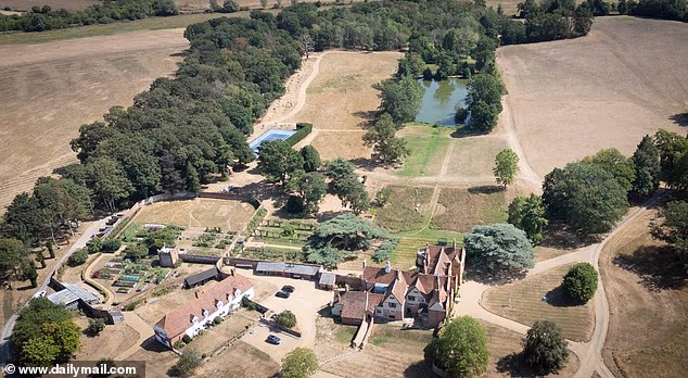 Jamie Oliver beats the hosepipe ban to maintain his backyard lush and inexperienced in record-breaking drought – by leveraging water from his personal individual lake