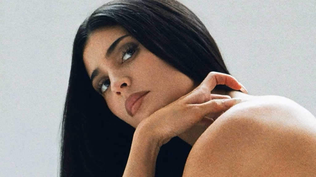 Kylie Jenner poses NUDE as she strips right down to solely heels for her recent Khy initiative… after ringing in twenty ninth birthday