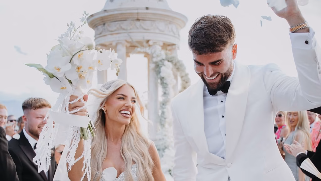 Love Island's Molly Smith and Tom Clare are married: Actuality star bride stuns in a beaded robe because the couple tie the knot in Mallorca after conference on relationship demonstrate