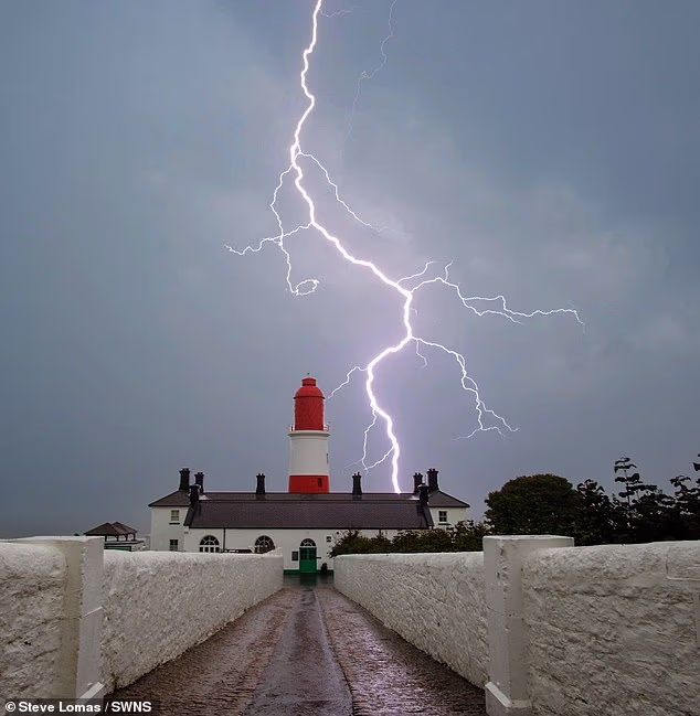 Storm alerts issued across Britain as festivalgoers brave mud