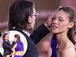 Brooklyn Beckham fixes Nicola Peltz’s hair on Venice red carpet