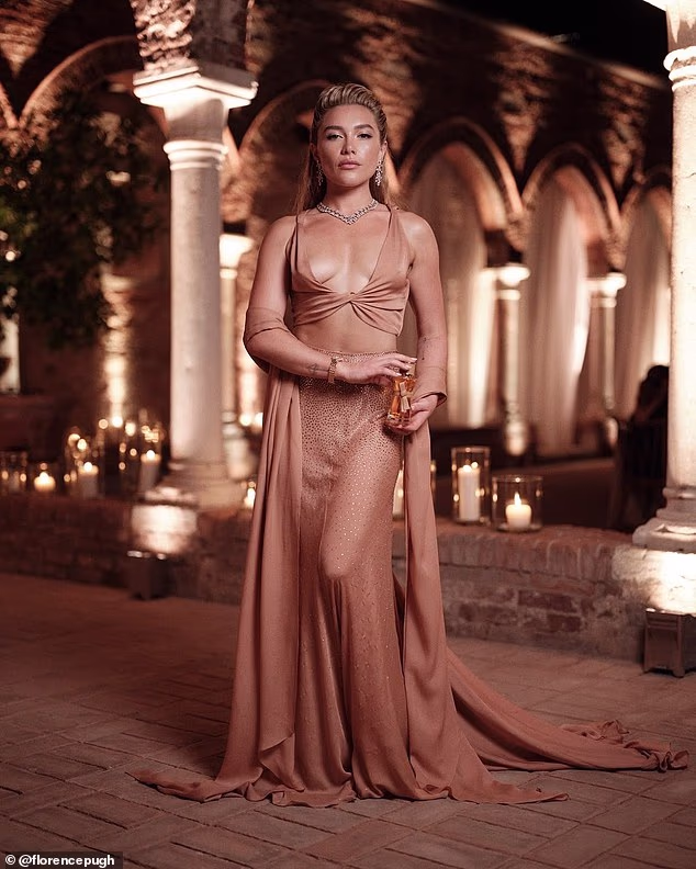 Florence Pugh dazzles in crop top and dramatic skirt in Venice