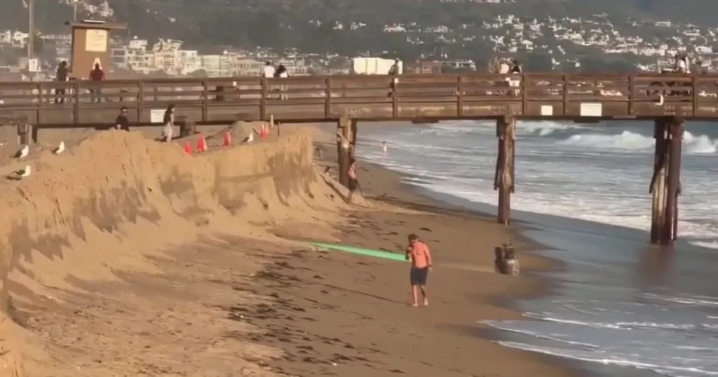 Hurricane Marie swell strips sand from Newport Beach