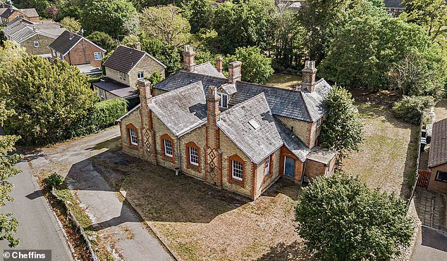 Nine-bed Cambridgeshire court with prison cells on sale for £800k