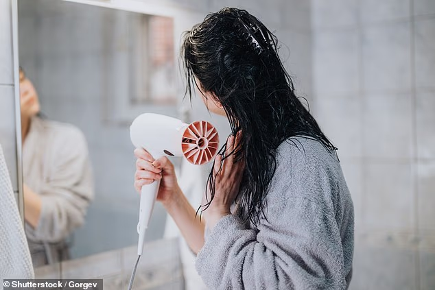 Drying hair from the ends upwards may help tame frizz, expert says