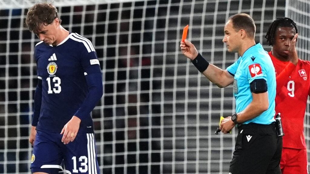 Ten-man Scotland lose to Switzerland in Pocognoli’s Hampden debut