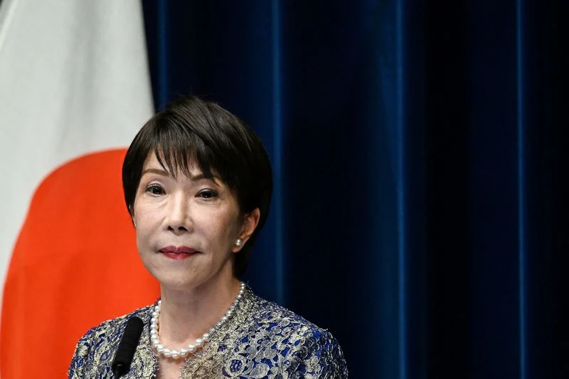 Japan PM pledges competitiveness drive to shore up yen
