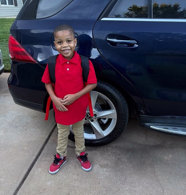 Four teenagers charged with murder of four-year-old shot in bed