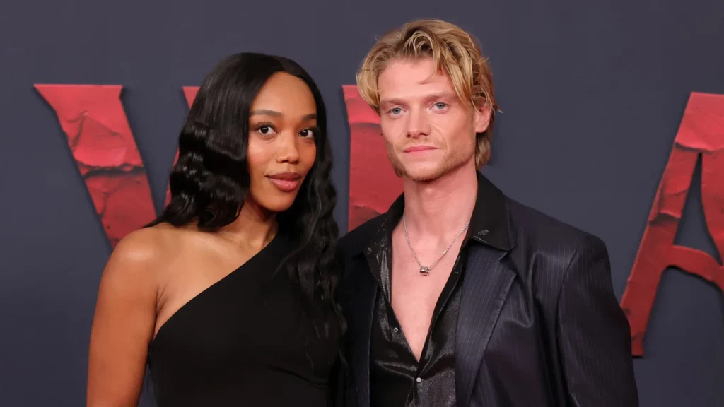 Harries and Ackie wear matching black at Clayface premiere