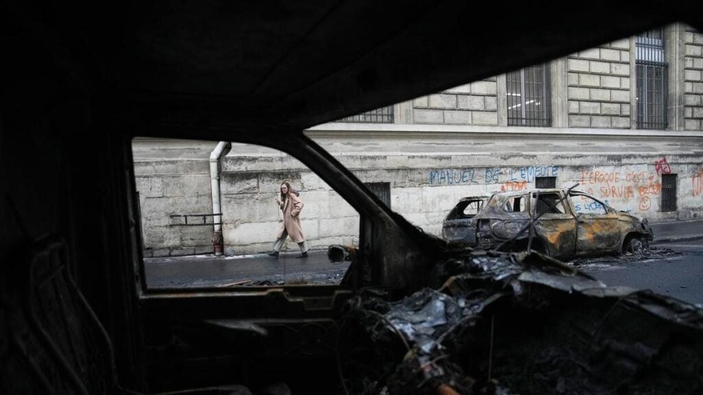 Curfews ease unrest in France as further protests are planned