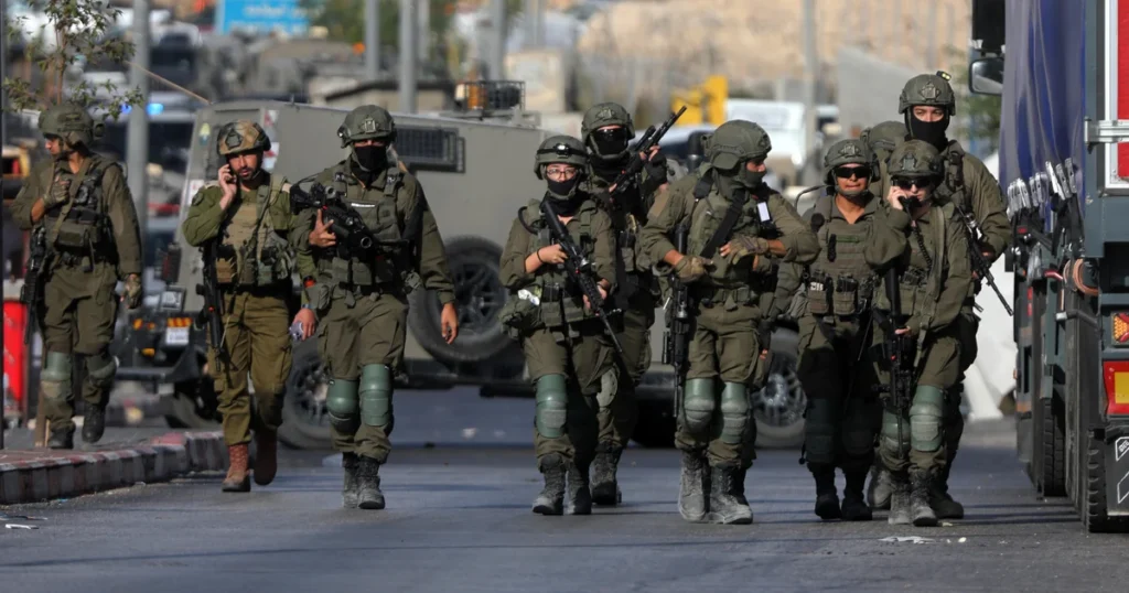 Netanyahu vows major offensive after attack as West Bank city shut